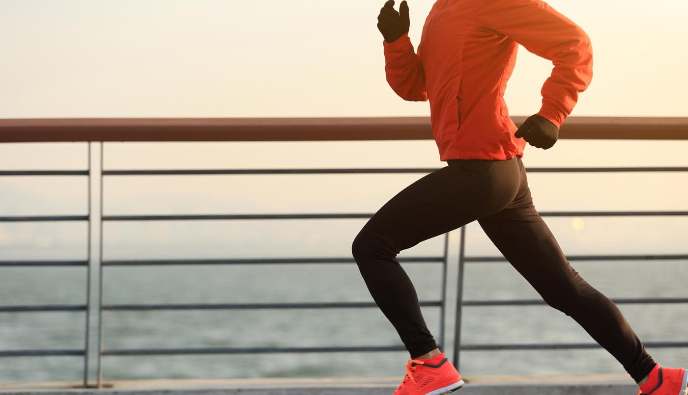 Runner on a seaside path