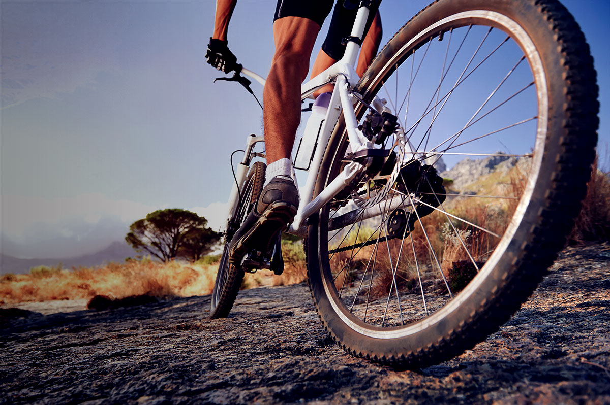 Mountain biker riding on a rocky trail