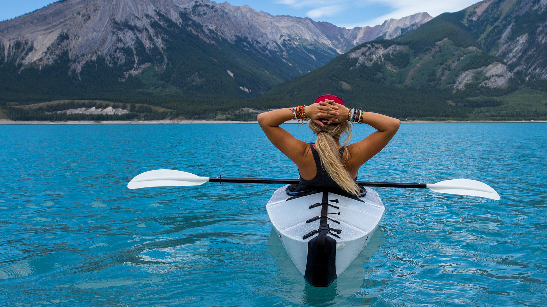 Kayaker on a mountain lake